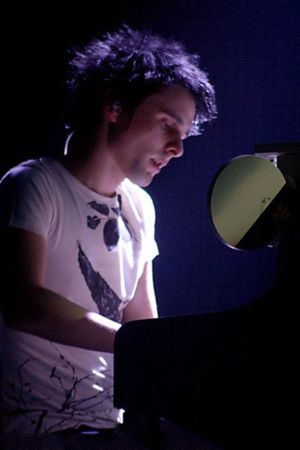 Matt playing piano in Vienna
